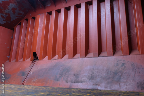 cargo hold red steel bulkhead of bulk carrier