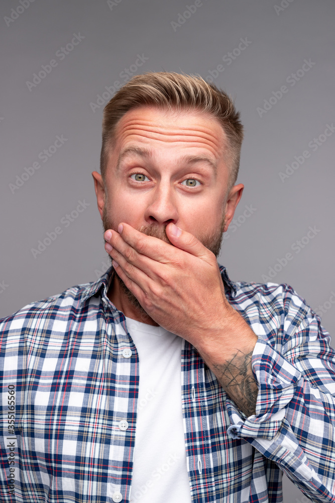 Joyful amazed man in studio Joyful amazed man in studio