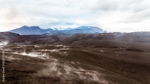 Volcanic steaming land near active volcano Tolbachik, Kamchatka, Russia