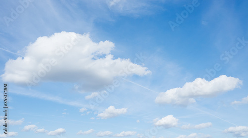 Beautiful blue sky and flying white clouds  no birds  nobody.