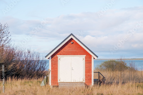 A neat minimalistic shed by the sea.