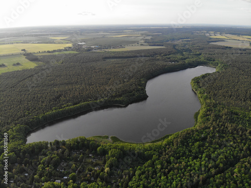 Aerial view of lake Fängersee near Strausberg (Brandenburg). Surrounding villages are Hirschfelde, Altlandsberg and Petershagen-Eggersdorf. The lake is located in the catchment area of Strausberg