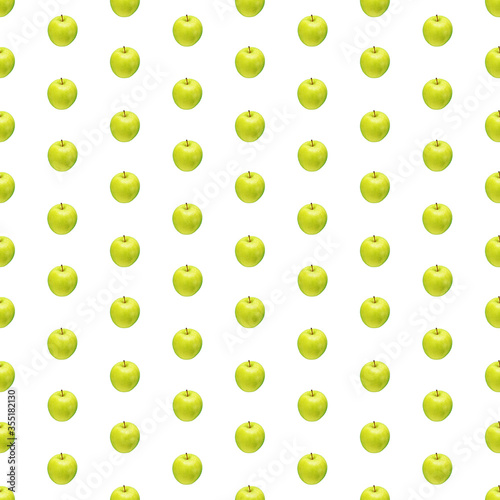 Pattern of green apples on a white background. Isolated fruits. Image for fabric, wallpaper and wrapping paper