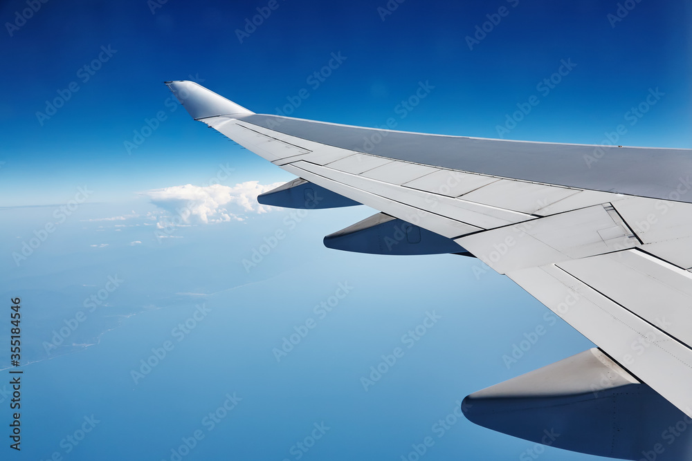 Obraz premium view from an airplane window down to the ground.