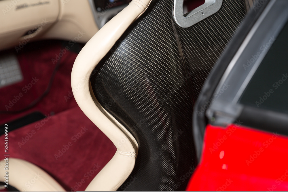 Close up of carbon fibre sports car seat