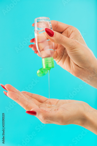 Woman apply sanitizer on hand