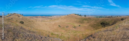 Red rock reserve including several craters of volcanic origin near Colac, Australia photo