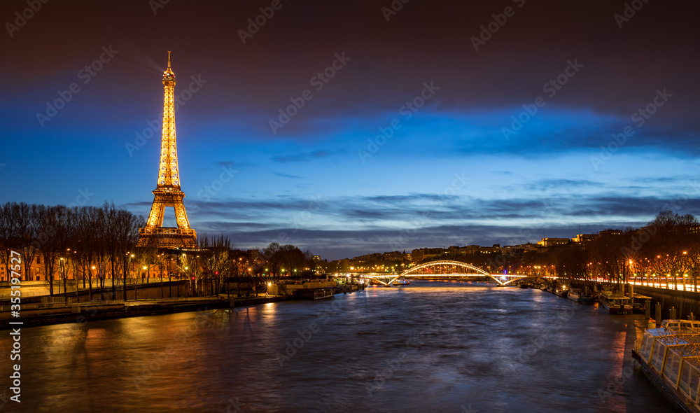 Paris, 75007, FRANCE - Mars 02, 2016: The Eiffel Tower illuminated at