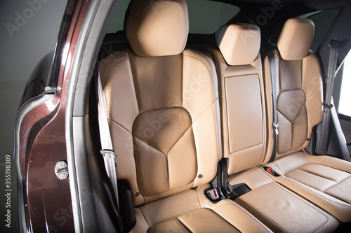 Brown passenger car seats of an SUV © camerarules