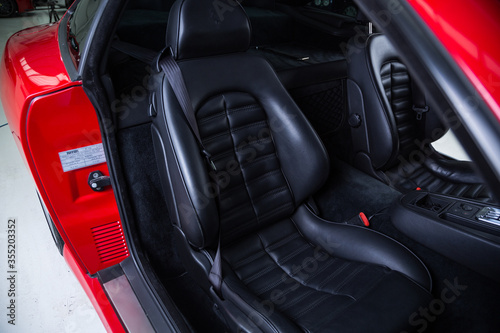 Black leather sports car seat © camerarules