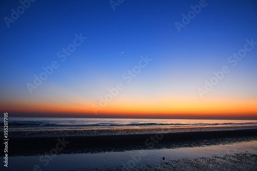 Evening at Mandvi Beach of Kutch  Gujarat  India beautiful sky sun and ocean  Sea  Beach