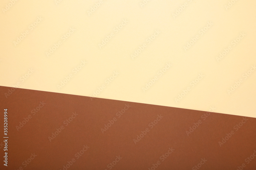 Multicolor background from a paper of brown and beige colors Multicolor background from a paper of brown and beige colors
