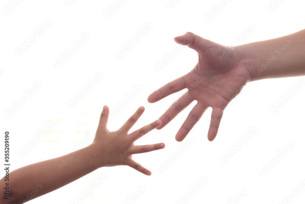 Small child's hand reaches fathers hand man isolated on white background