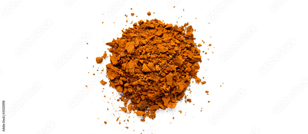 chaga mushroom. a pile of small pieces natural wild birch fungus chaga isolated on white background. top view. banner chaga mushroom. a pile of small pieces natural wild birch fungus chaga isolated on white background. top view. banner
