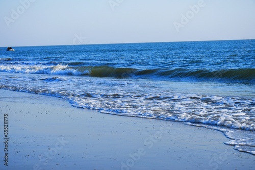 Evening at Mandvi Beach of Kutch  Gujarat  India beautiful sky sun and ocean  Sea  Beach