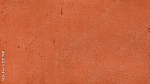 Bilde på lerret Orange painted wall texture with copy space