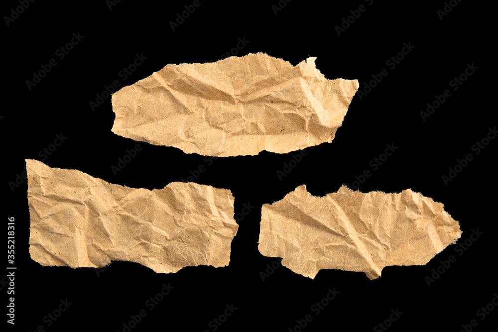 Three pieces of recycled paper for text isolated on black Three pieces of recycled paper for text isolated on black