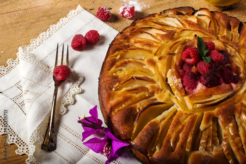 homemade apple pie with raspeberries heart photo