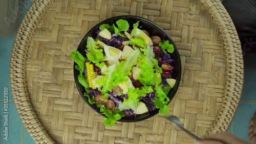 Slow motion,Top view, family is eating salad together,salad beautifully served, healthy food, nutrition