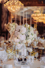wedding decorations with flowers and candles. banquet decor. picture with soft focus