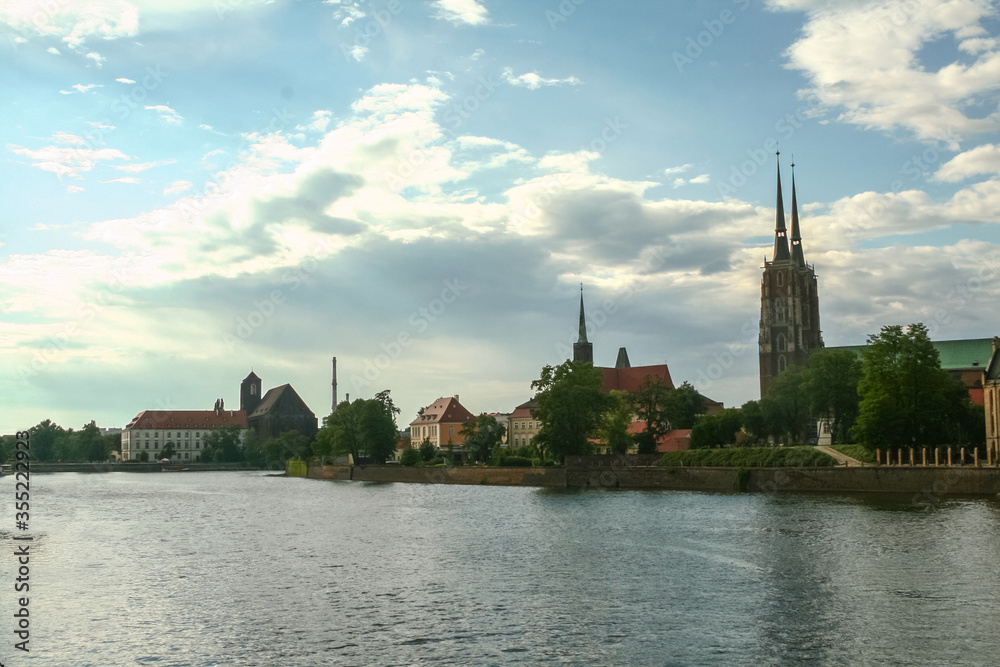 Wroclaw cathedral, also called cathedral of st. john the baptist or katedra sw. jana chrzciciela, seen from an island on Oder river. It is a Catholic cathedral and a symbol of Wroclaw, poland.