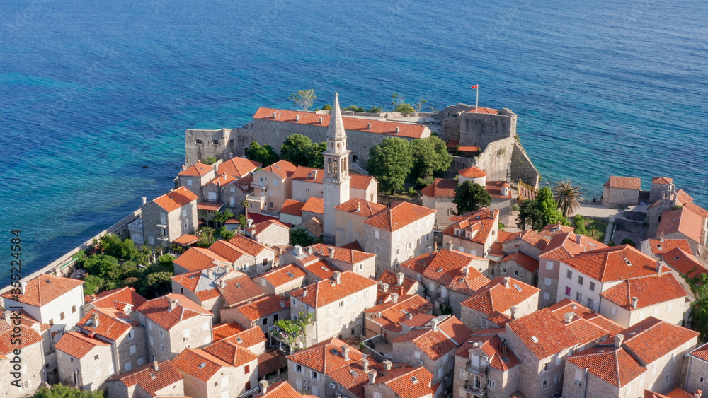 Fototapeta premium Budva is the center of tourism in Montenegro and the main vacation destination for summer holidays on the Adriatic coast, in the Mediterranean. Medieval old town is the most prominent landmark.