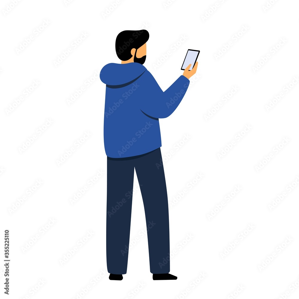 A man holds a smartphone in his hands. A young guy works on the Internet. A man holds a smartphone in his hands. A young guy works on the Internet.