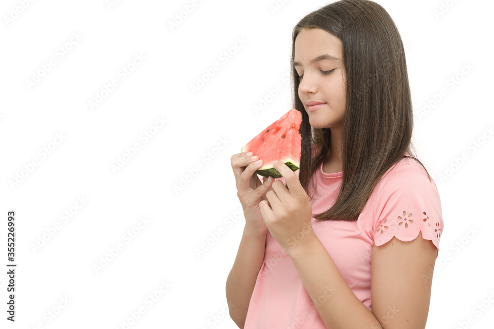 young teenage girl holding a piece of juicy watermelon.isolated on a white background.