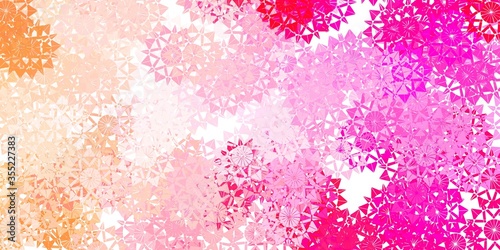 Light Pink vector pattern with colored snowflakes.