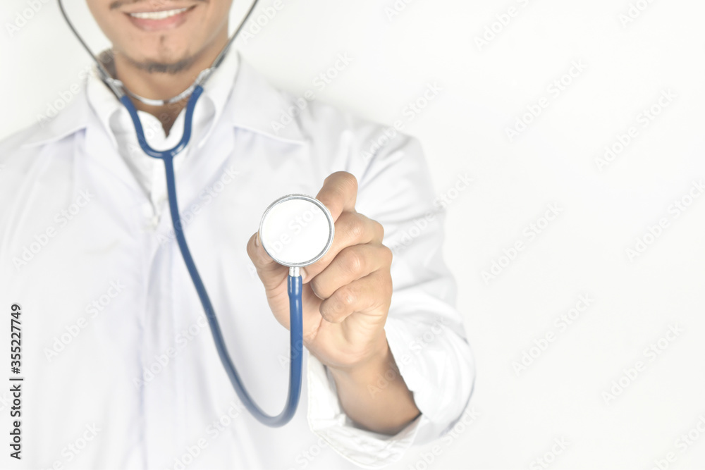 doctor holding stethoscope on white background. doctor holding stethoscope on white background.
