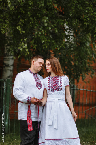 A couple in love in Russian traditional dresses