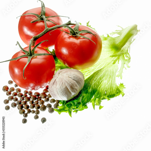 fresh green salad red tomato papper garlic isolated white background