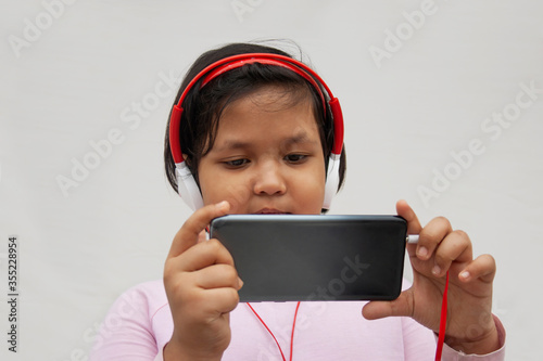 Photography Close-up Girl Listening Music While Using Smart Phone