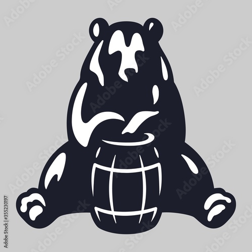 Bear with wood barrel of beer or honey