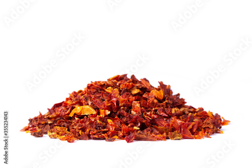 Fototapeta Naklejka Na Ścianę i Meble -  tomato flakes in white natural spice