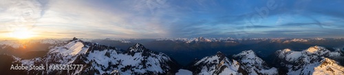 Aerial Panoramic View of Canadian Mountain Landscape, Tantalus Range, during a colorful sunset. Taken near Squamish, North of Vancouver, British Columbia, Canada. Nature Background Panorama © edb3_16