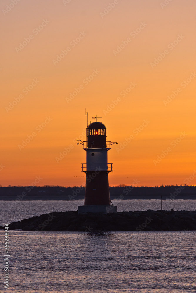 Lighthouse at Warnemünde Port While Sunrise, Rostock, Baltic Sea, Mecklenburg Western Pomerania, Germany, Europe
