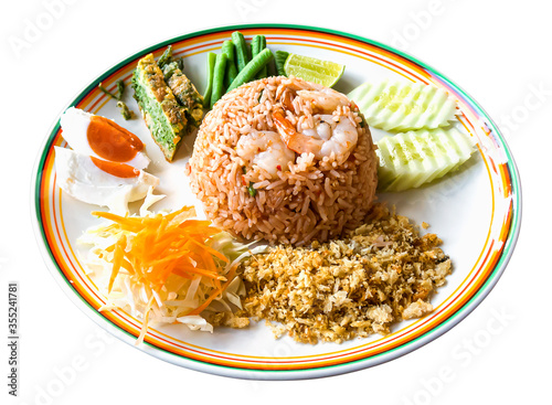 Thai food - Kao Cluk Ka Pi (Mixed Cooked Rice with Shrimp Paste Sauce) on white round dish photo