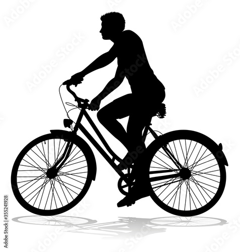 A bicycle riding bike cyclist in silhouette