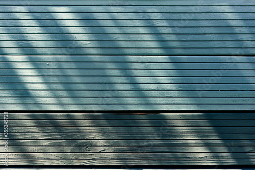 Wood wall in the shadows