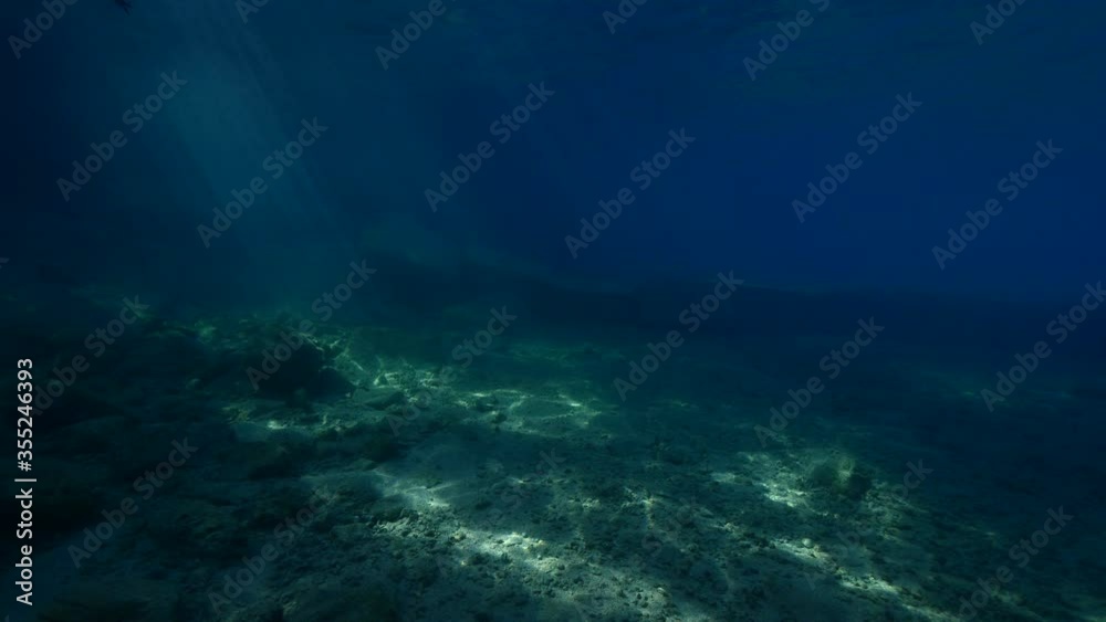 sun ray and sun beam scenery underwater waves on surface of water slow ocean scenery sun ray and sun beam scenery underwater waves on surface of water slow ocean scenery