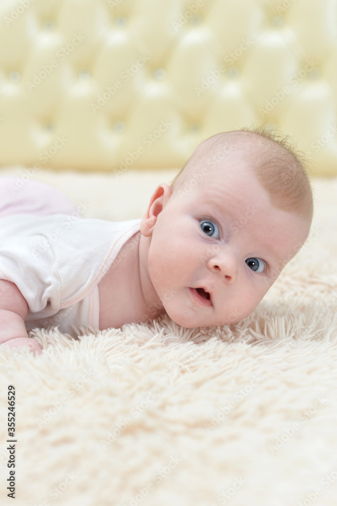 Portrait of funny little baby girl crawling Portrait of funny little baby girl crawling