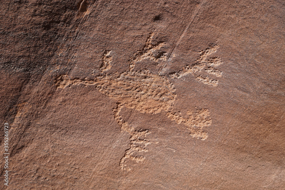 Basketmaker Petroglyphs of an alien carved into a rock wall in Indian Creek, Utah. Basketmaker Petroglyphs of an alien carved into a rock wall in Indian Creek, Utah.