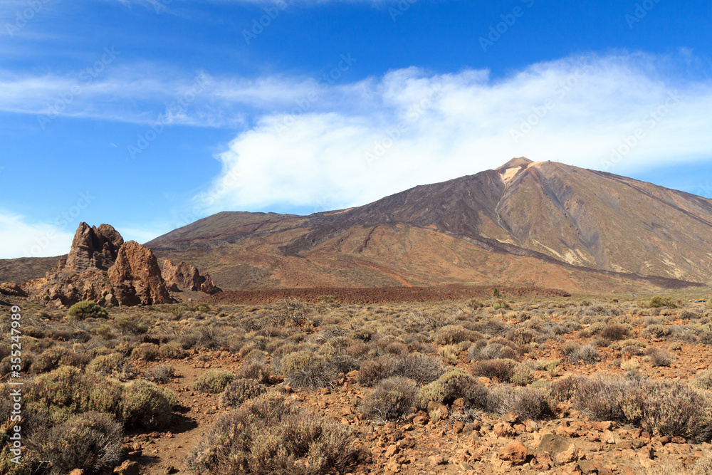 Volcano Mount Teide peak and rock formations Roques de Garcia in Teide National Park on Canary Island Tenerife, Spain Volcano Mount Teide peak and rock formations Roques de Garcia in Teide National Park on Canary Island Tenerife, Spain