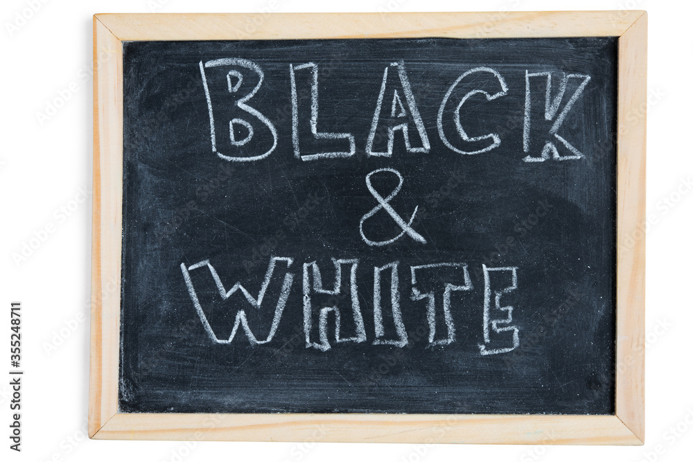 Fototapeta premium Black and White - written on chalkboard. Concept message