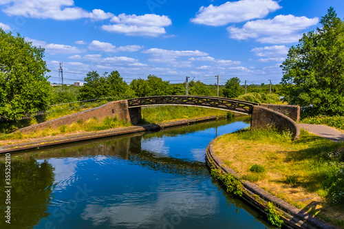 A bridge at the junction of the Birmingham and Dudley canals in summertime