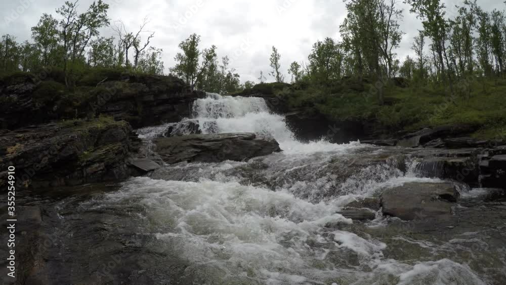 big mountain stream waterfall in northern norway big mountain stream waterfall in northern norway