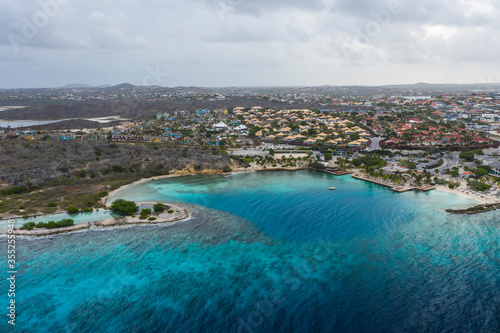 Fototapeta Naklejka Na Ścianę i Meble -  Aerial view of coast of Curacao in the Caribbean Sea with turquoise water, cliff, beach and beautiful coral reef