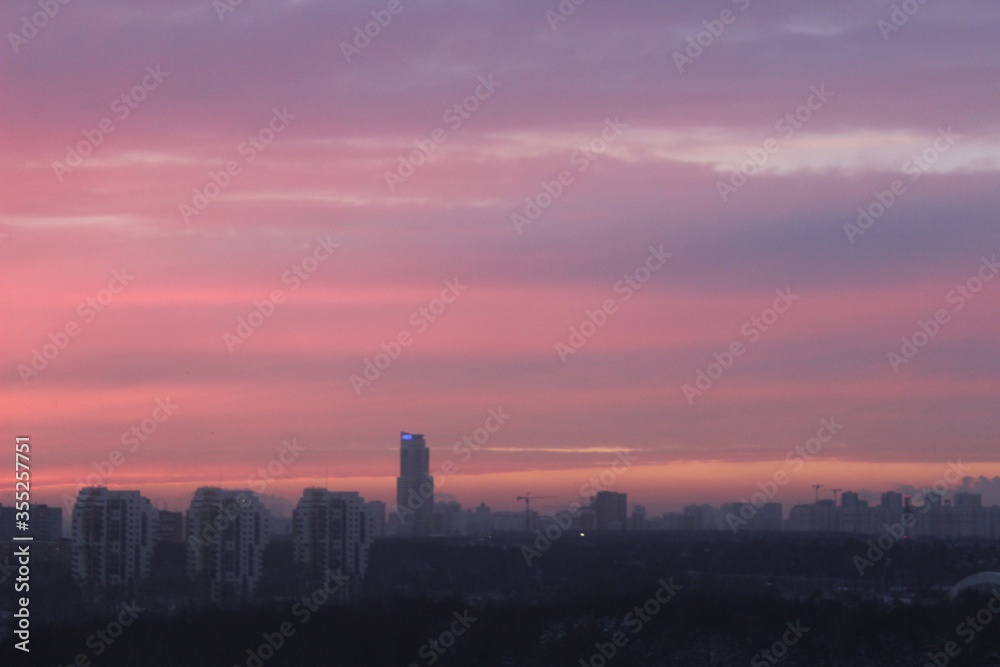 Naklejka premium sunset over the city