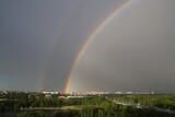 Rainbow over the city in June.